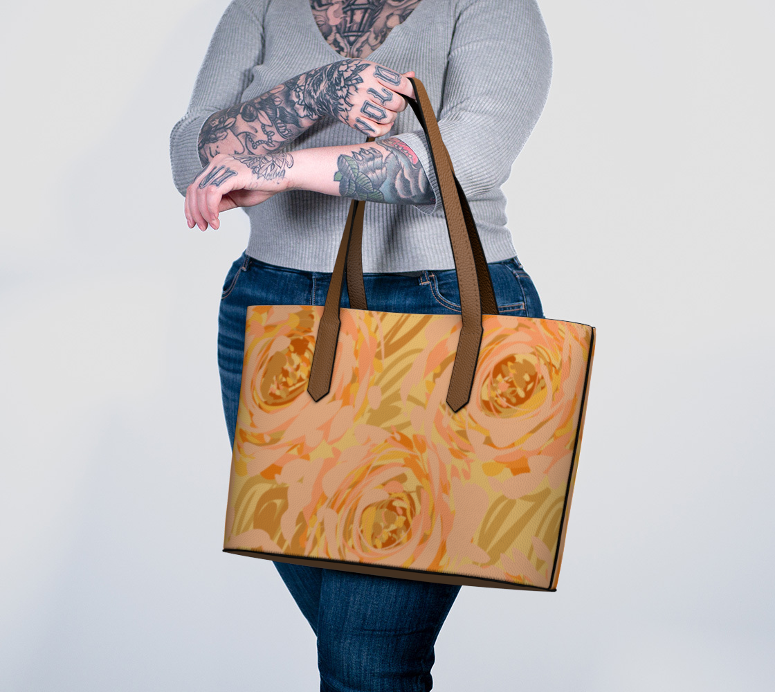 Queen of Petals Apricot Blooms Vegan Leather Tote Bag carried on arm showing handle comfort