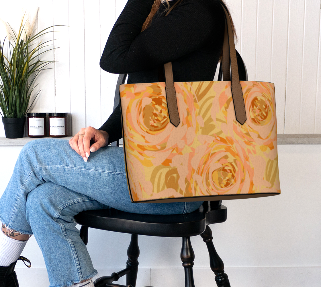 Queen of Petals Apricot Blooms Vegan Leather Tote Bag worn on shoulder demonstrating 18 inch width