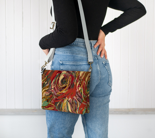 Queen of Petals Boho Roses Vegan Leather Crossbody Purse worn on shoulder, hands-free styling