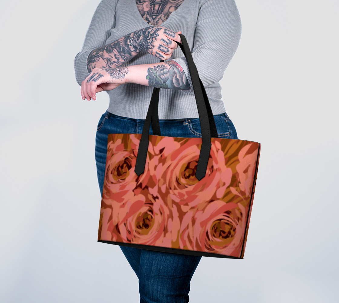 Queen of Petals Coral Bronze Vegan Leather Tote carried on arm, professional styling