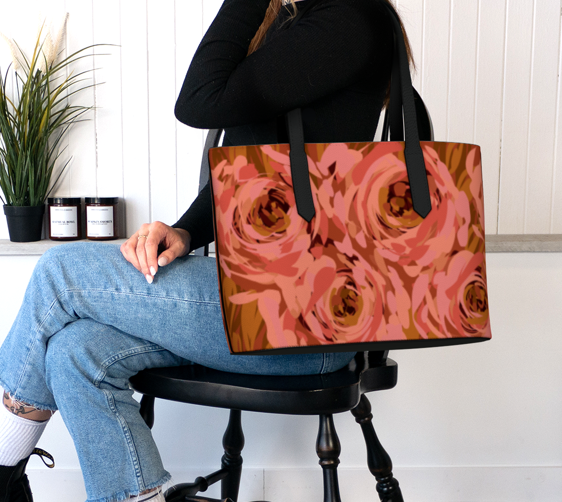 Queen of Petals Coral Bronze Vegan Leather Tote worn on shoulder with laptop capacity
