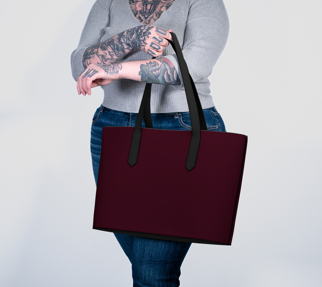 Queen of Petals Darkest Merlot Tote Bag carried on arm, showing 18 inch width and handles