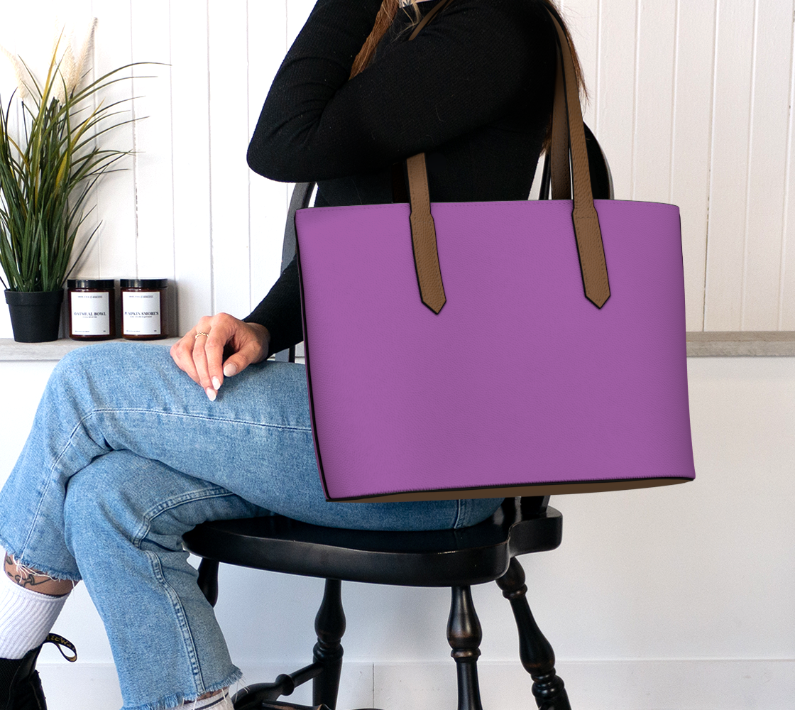 Queen of Petals The Gallery Deep Orchid Tote worn on shoulder, demonstrating capacity for laptop and gallery materials