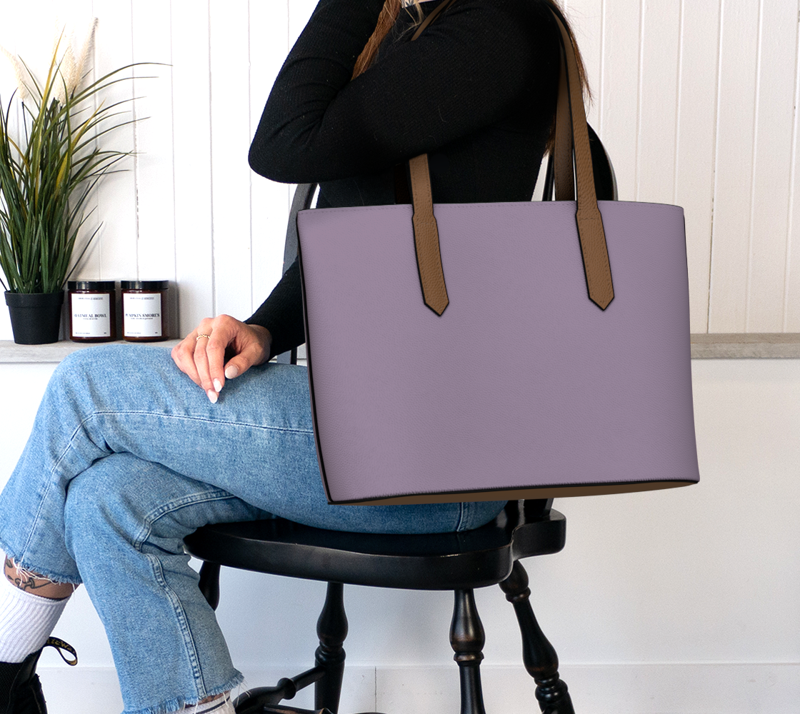 Queen of Petals Twilight Lilac Plum Lilac Tote, worn on shoulder, plum lilac leather with 22 inch strap