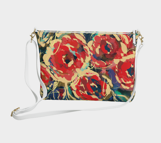 Front view of the Anouk Collection vegan leather crossbody purse, featuring vibrant floral design in deep reds, teals, and soft neutrals. Crafted from high-quality vegan pebble leather, this compact purse offers an eco-conscious, stylish solution for on-the-go convenience. Digitally printed on demand with UV inks for a unique and durable accessory.