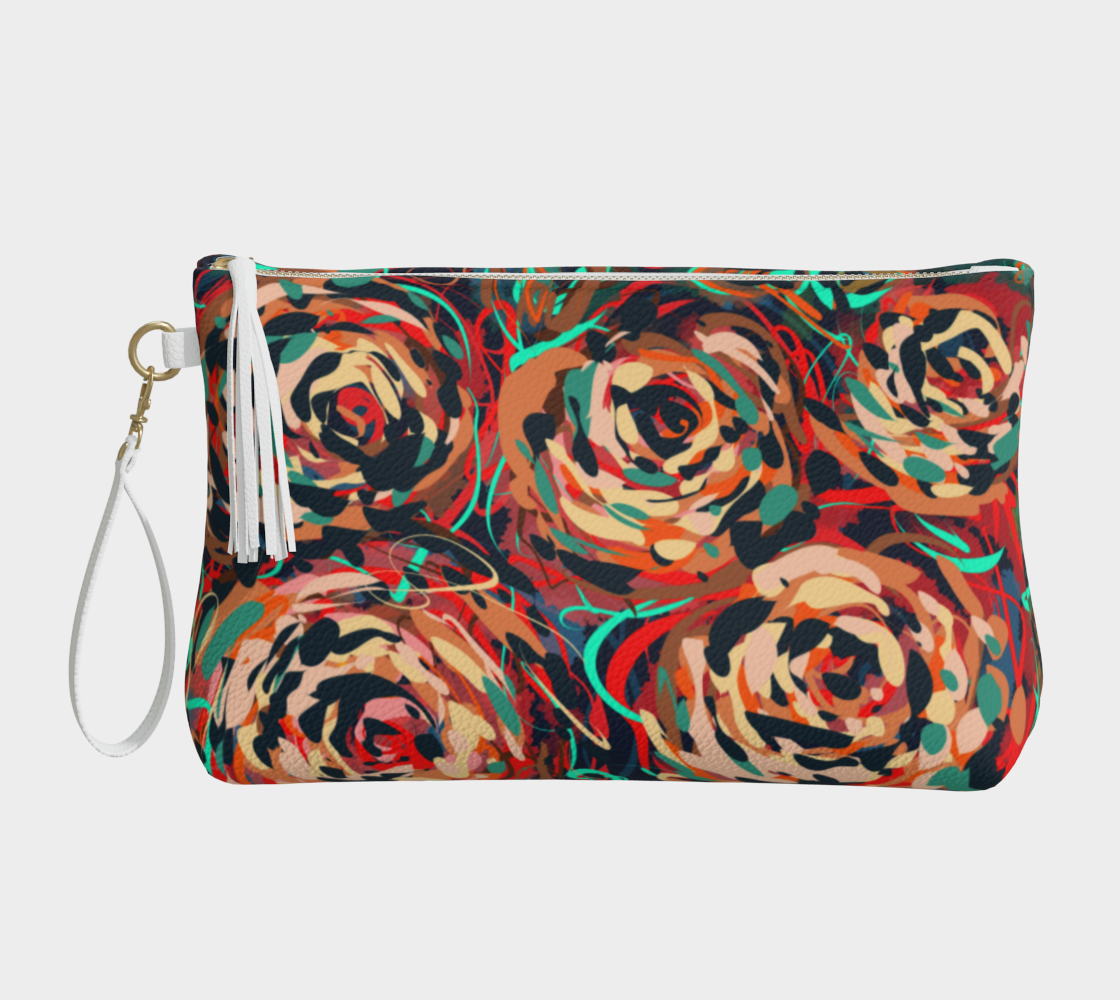 Blythe Collection Vegan Leather Makeup Bag in Floral, front view. Crafted from premium textured vegan pebble leather with a chic floral print, this stylish bag features a secure metal zipper with a fashionable tassel and a convenient wristlet strap for easy carrying.