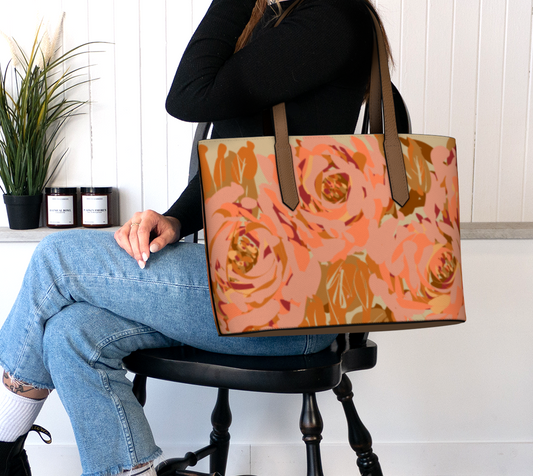 Queen of Petals Copper Sunset Vegan Leather Tote, carried on arm, displaying professional proportions