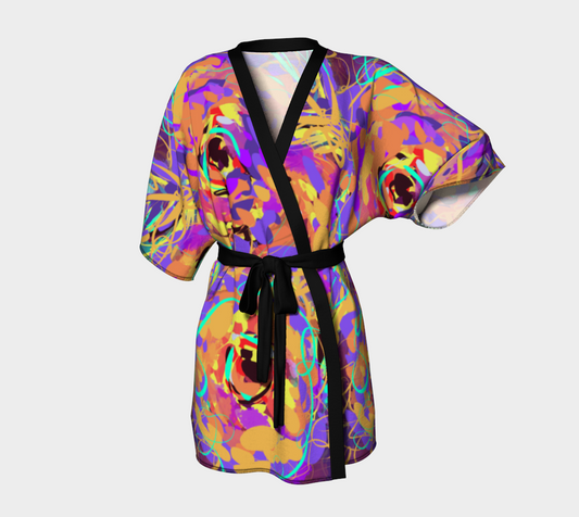 Front view of the Cordelia Collection Kimono Robe in Floral, showcasing vibrant rose patterns in purple, yellow, and blue for a bold and artistic fashion statement.