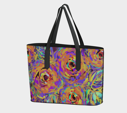 Cordelia Collection Vegan Leather Tote Bag in Floral, front view. This eco-friendly tote bag features a vibrant floral design in purple, yellow, and blue roses, crafted from premium vegan pebble leather. It includes a secure magnetic snap closure and a spacious interior with inner pockets for organized storage.