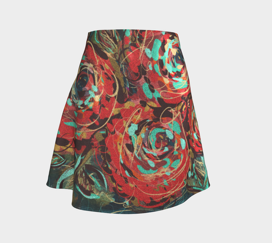 Le Rous Collection Shimmer Flare Skirt in Floral, front view. The skirt features vibrant red roses entwined with bold teal and earthy tones, bringing nature’s wild beauty into your wardrobe. Crafted with EcoPoly fiber for an eco-friendly, sustainable choice.