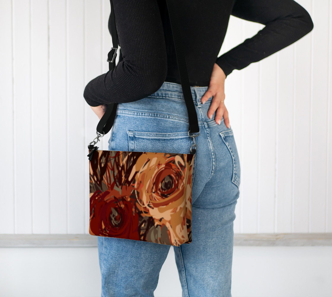 Queen of Petals Artisan Auburn Vegan Leather Crossbody Purse worn on shoulder, showing hands-free styling
