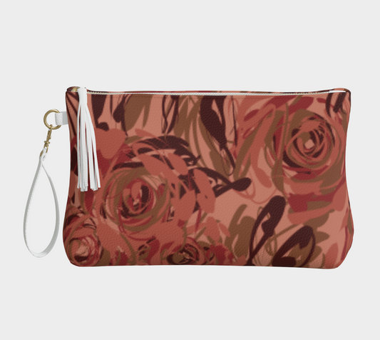 Queen of Petals Blush Pink Vegan Leather Clutch, front view, featuring terracotta roses and tassel detail