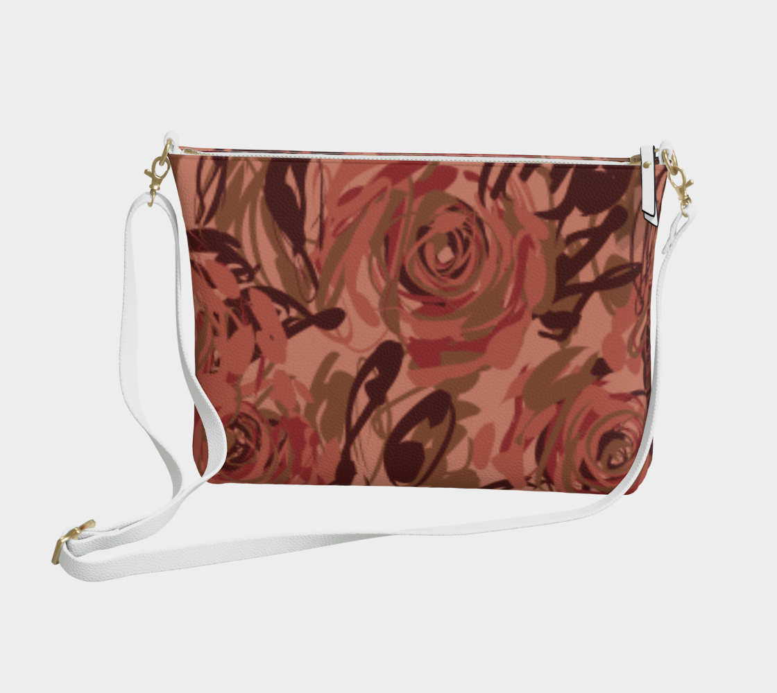 Queen of Petals Blush Pink Vegan Leather Crossbody Purse, front view, with painterly rose design and adjustable strap