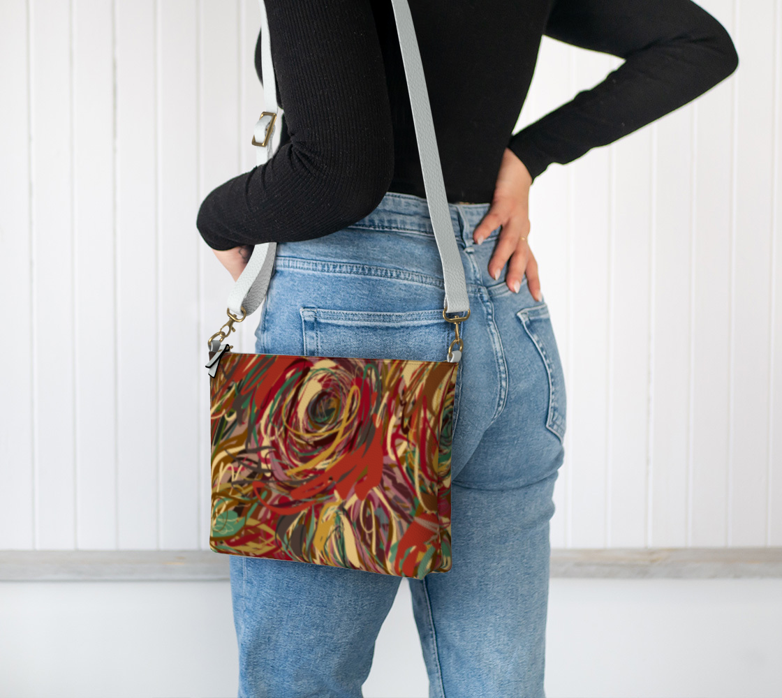 Queen of Petals Boho Roses Vegan Leather Crossbody Purse worn on shoulder, hands-free styling