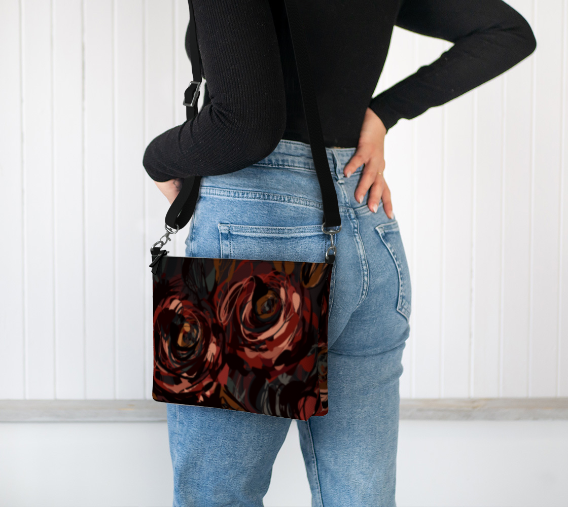 Queen of Petals Château Noir Vegan Leather Crossbody Purse worn crossbody style