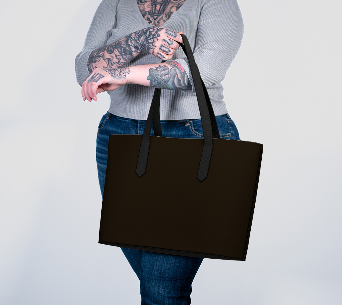 Queen of Petals Chocolate Brown Deep Roasted Tote Bag carried on arm showing laptop capacity