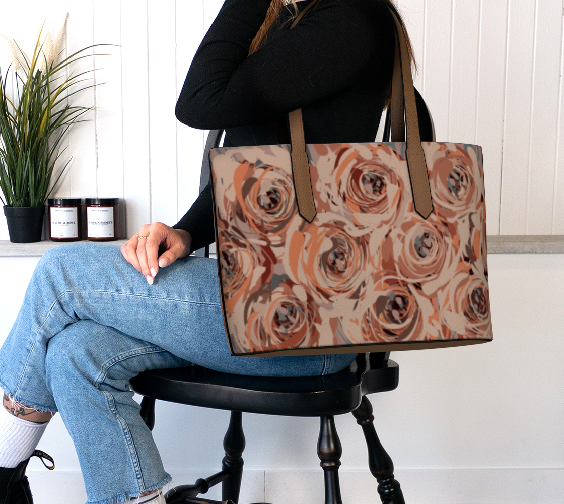 Queen of Petals Mauve Rose Vegan Leather Tote Bag worn on shoulder, fits 16 inch laptop