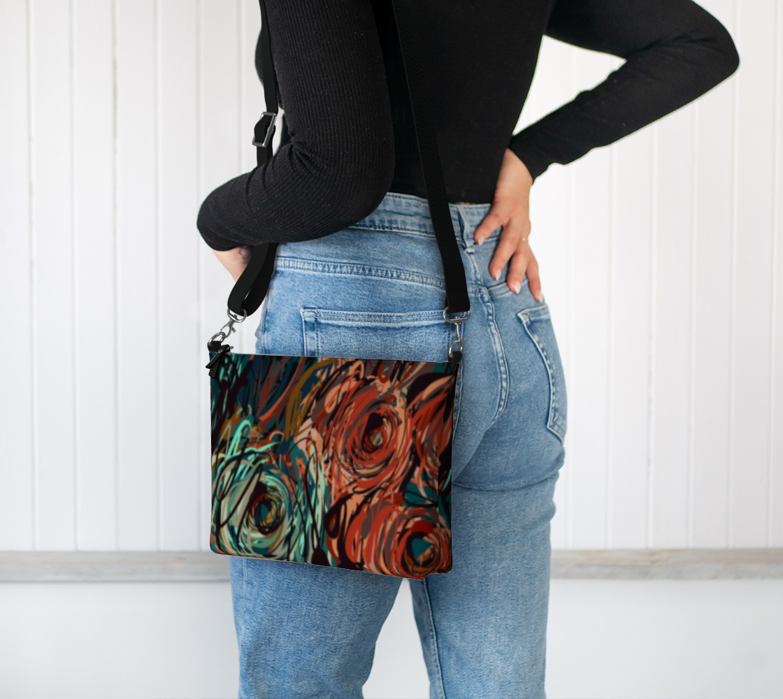 Queen of Petals Patina Crossbody worn on shoulder with adjustable 26-46 inch strap
