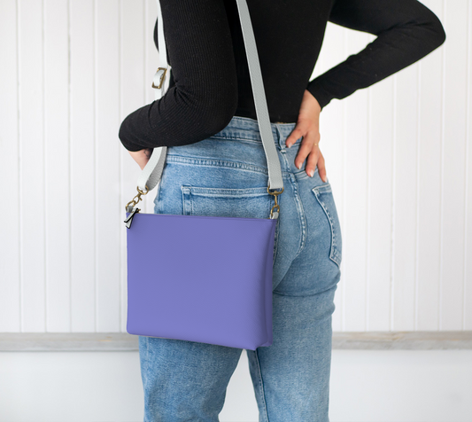 Queen of Petals Periwinkle Resolve Wisteria Crossbody, worn crossbody style with adjustable strap, wisteria periwinkle