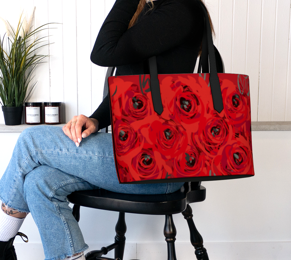 Queen of Petals Ruby Red Roses Vegan Leather Tote Bag, worn on shoulder, crimson leather against neutral outfit