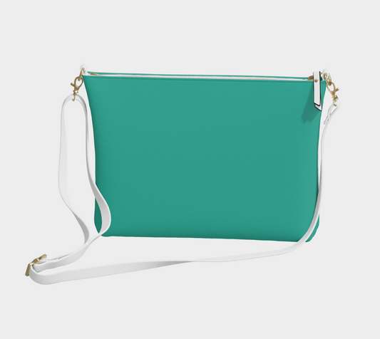 Queen of Petals Teal Collection Teal Vegan Leather Crossbody Purse front view with metal zipper and white adjustable strap