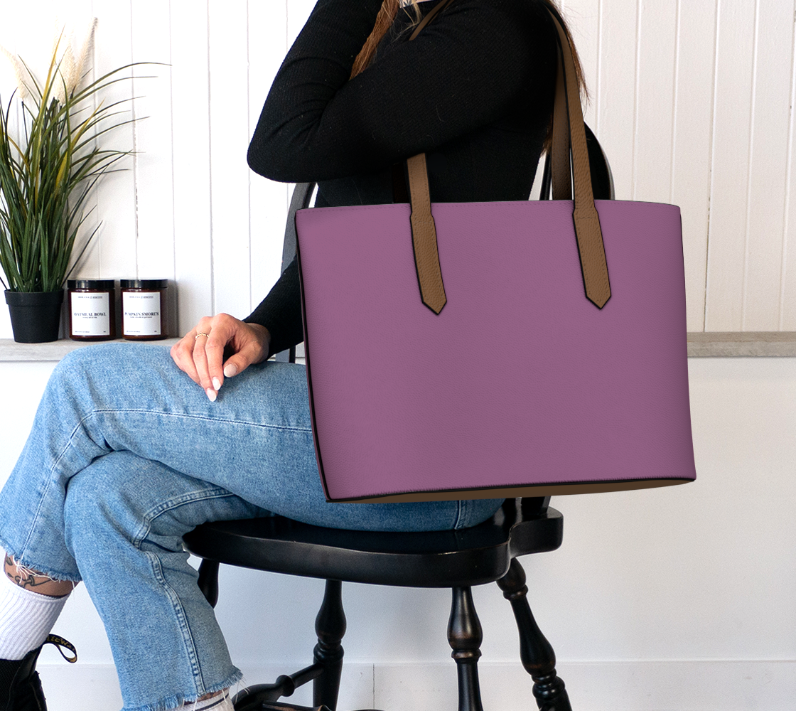 Queen of Petals The Alchemist wine plum tote bag, worn on shoulder, magnetic snap closure visible