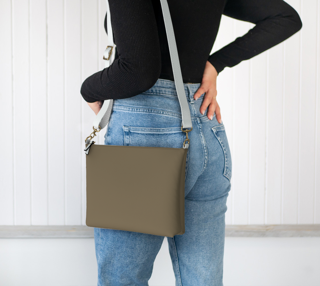 Queen of Petals The Ceramics Kiln Vegan Leather Crossbody, worn on the shoulder, showcasing the adjustable strap.