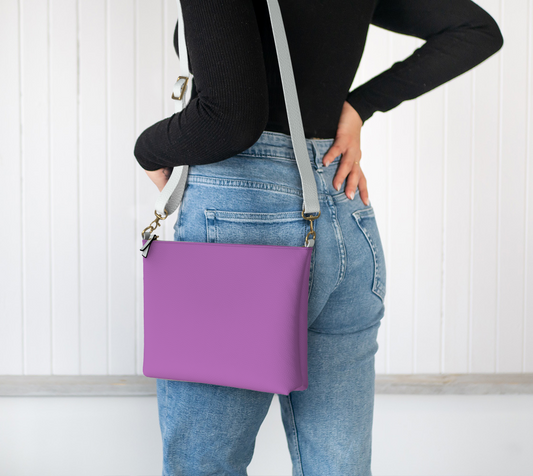 Queen of Petals The Gallery Violet Orchid Crossbody worn on shoulder with adjustable strap set to comfortable length