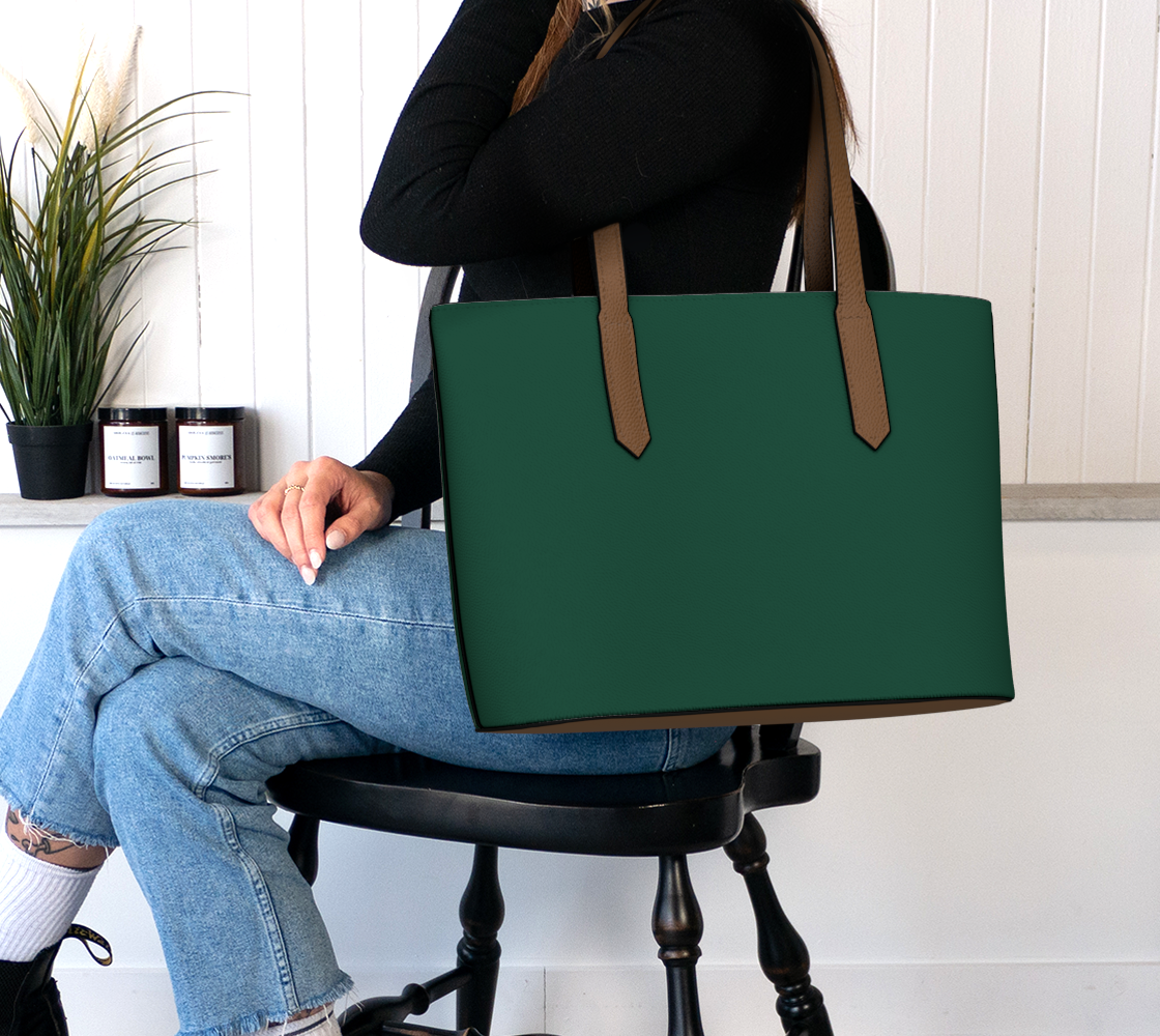Queen of Petals The Prop Master Dark Emerald Tote Bag, worn on shoulder showing full lining with inner pockets