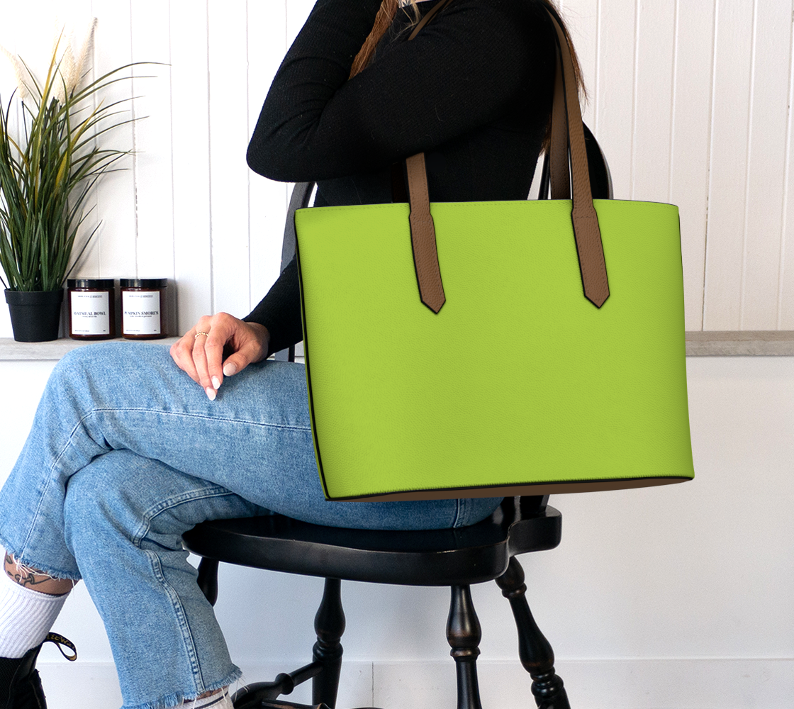 Queen of Petals The Propagator Dark Chartreuse Tote Bag, carried on arm showing strap length and drape