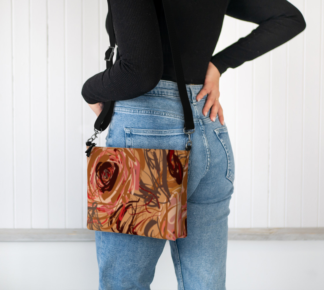 Queen of Petals Vintage Blooms Vegan Leather Crossbody Purse worn on shoulder with adjustable strap