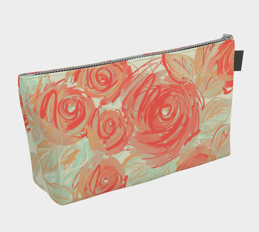 Back view of Xyla makeup bag showing coral floral print and durable canvas construction
