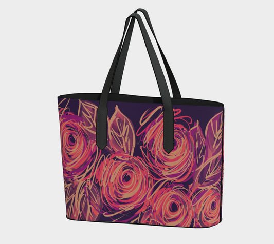 Front view of the Queen of Petals Yvaine Vegan Leather Tote featuring radiant coral, gold, and blush roses on a midnight starlit canvas.
