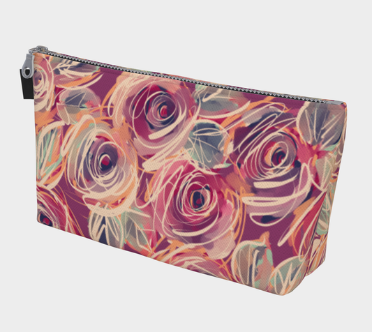 Zenith Rose makeup bag standing upright, showcasing vibrant floral print on structured canvas.