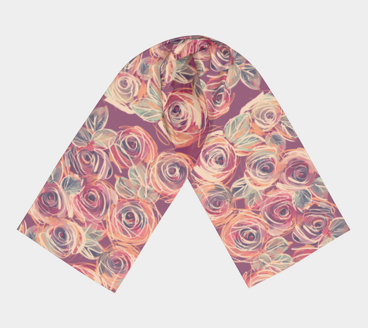 Flat lay of the Zenith Rose long silk scarf, revealing detailed floral artwork and rich color gradients on soft, high-quality fabric.