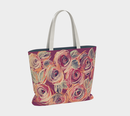 Back view of the Zenith Rose Sovereign Tote Bag showing vibrant, swirling hand-painted roses in coral, blush, and berry tones on durable cotton canvas. Spacious, lined interior with zippered and slip pockets for organized essentials.