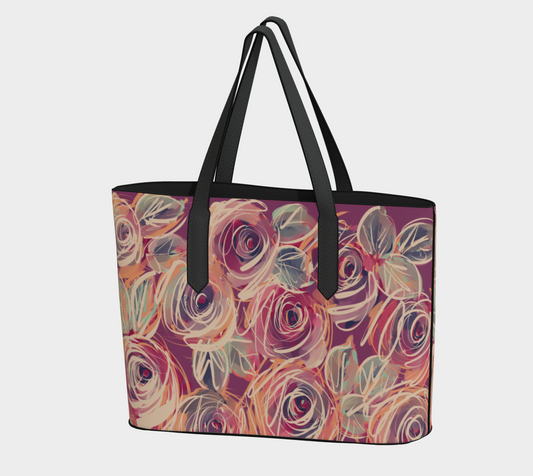 Zenith Rose vegan leather tote with bold black straps, standing upright and showcasing floral design with a rich black base.