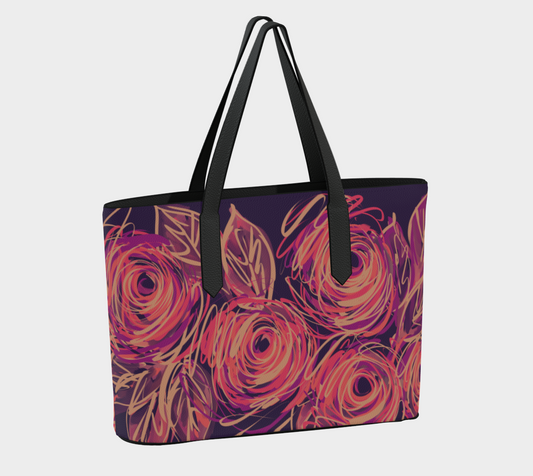 Back view of the Queen of Petals Yvaine Vegan Leather Tote showcasing celestial fire-inspired abstract rose patterns in coral, gold, and blush.