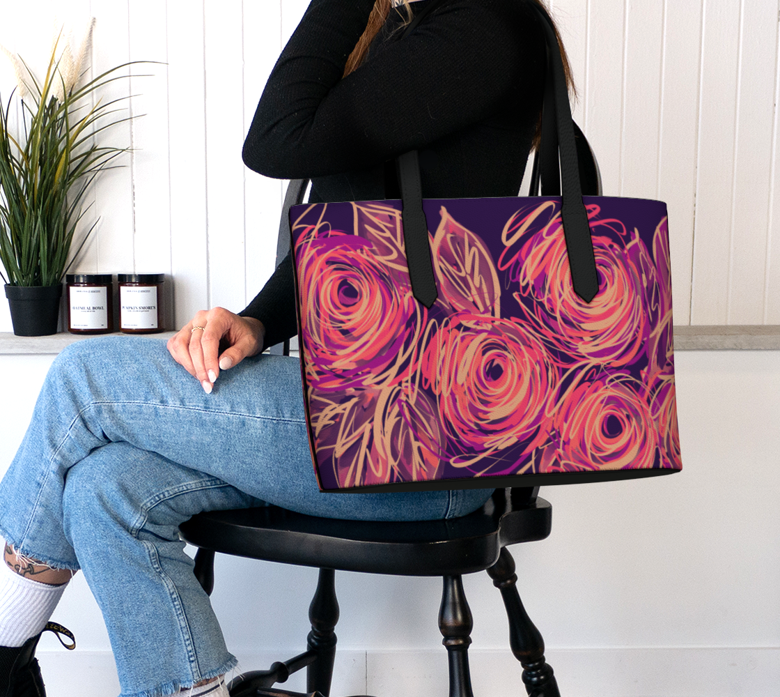 Woman carrying the Queen of Petals Yvaine Vegan Leather Tote on shoulder, crafted from premium cruelty-free vegan leather with black solid straps and magnetic snap closure.