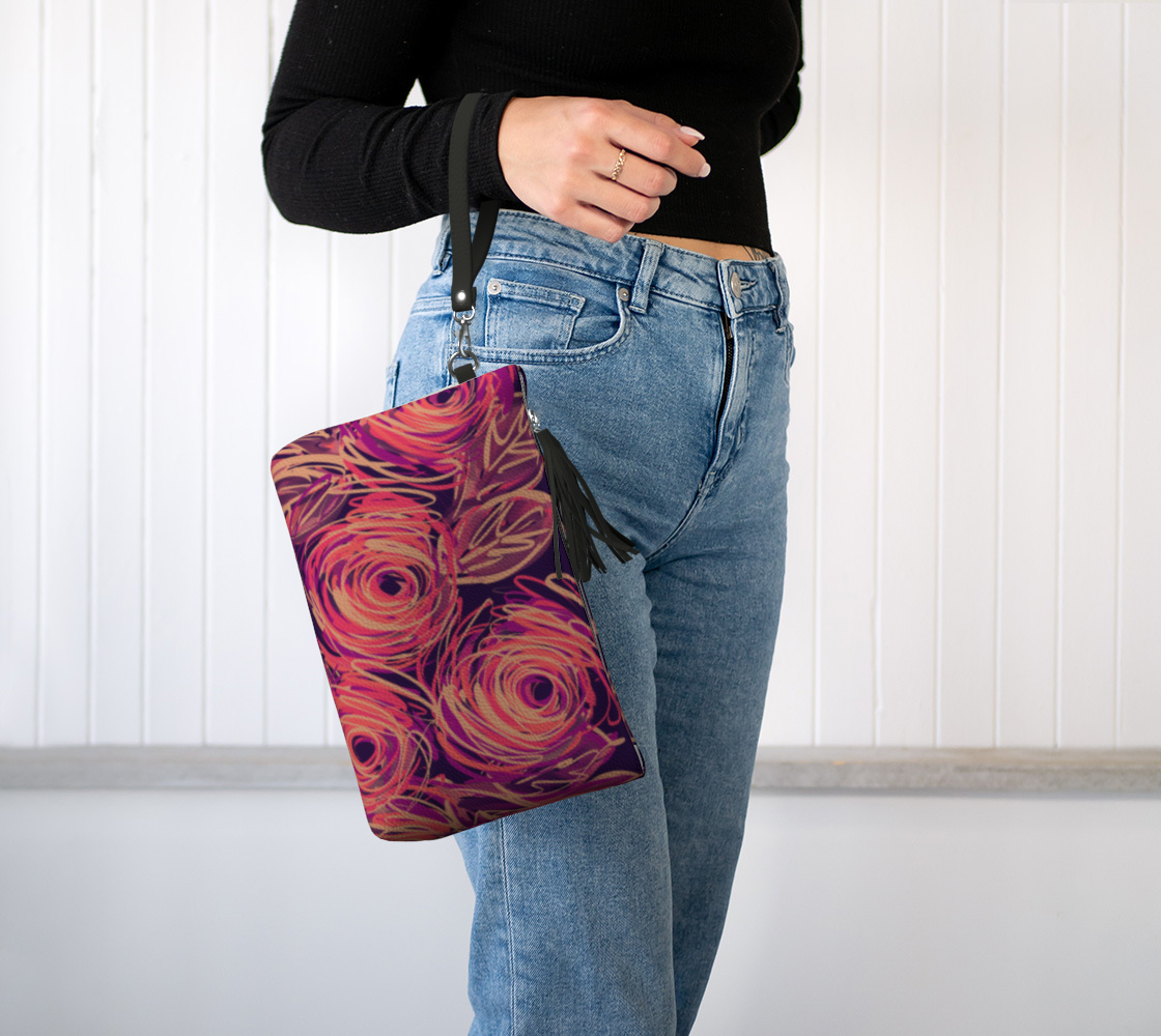 Yvaine Vegan Leather Clutch worn on wrist demonstrating elegant styling for date nights, gallery walks and everyday enchantment